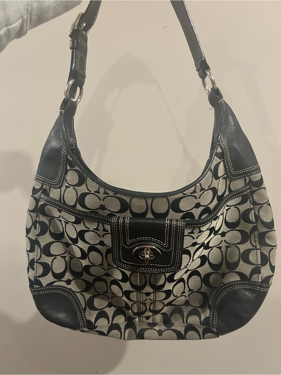 Coach Handbags - VINTAGE Coach Black and Cream Signature Hobo with Turn-Lock Front